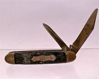 Old two blade pocket knife......To register in order to place bids go to www.capitolsalesservices.hibid.com