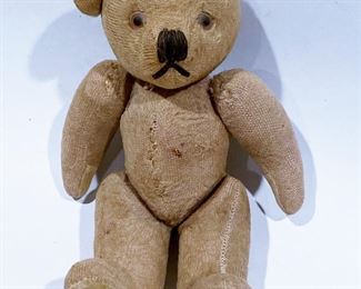 Another pre-1930 Teddy Bear........To register in order to place bids go to www.capitolsalesservices.hibid.com