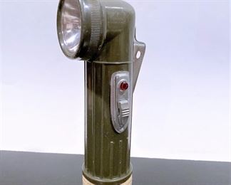 Vintage flashlight.........To register in order to place bids go to www.capitolsalesservices.hibid.com