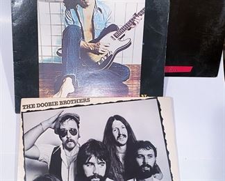 Vintage vinyl LP record albums, Jefferson Starship, Billy Squier and The Doobie Brothers.......To register in order to place bids go to www.capitolsalesservices.hibid.com