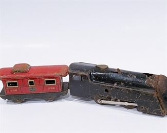 1940s Toy Train Windup Engine and Caboose ......To register in order to place bids go to www.capitolsalesservices.hibid.com