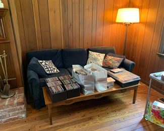 CDs, tapes, corduroy sleeper sofa, coffee table