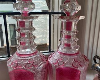 Stunning pink and clear liquor bottles