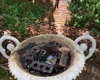 Interior of monumental cast-iron garden urn to give perspective