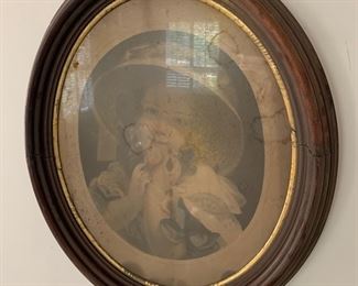 Large oval walnut frame