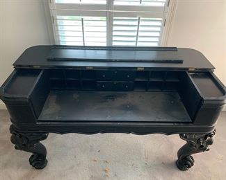 Massive square piano converted into a desk