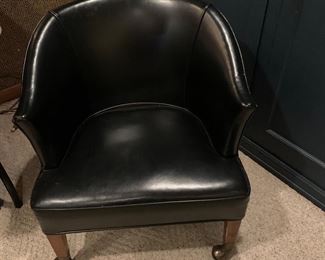 Four leather rolling chairs