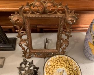 brass frame, Bacchus match safe, Mr. Peanut bowl