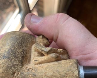 Hand carved smoking pipe "But Smoked Out"