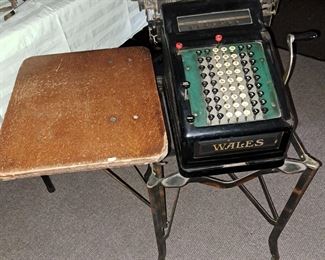 Antique and modern office equipment. "Wales" adding machine on stand