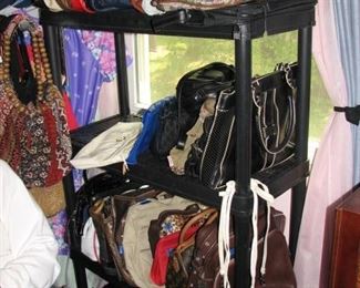 this shelf is full of purses, there are more that this too