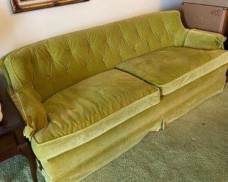 Vintage mid-century modern green tufted sofa by Henredon.