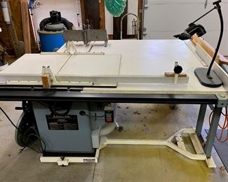 DELTA 10" TILTING ARBOR SAW TABLE UNISAW. ON WHEELS.