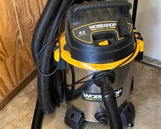 LIKE NEW STAINLESS SHOP VAC WITH TOOLS.