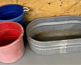 LARGE FEEDER BUCKETS AND WATER TROUGH.