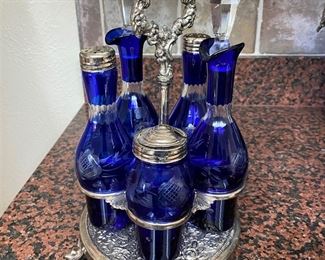ELEGANT ANTIQUE COBOLT BLUE CUT TO CLEAR CRYSTAL CRUET SET. SET CAME FROM THE OKLAHOMA GOVERNORS MANSION.