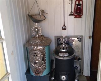 2 nicely restored wood burning parlor stoves