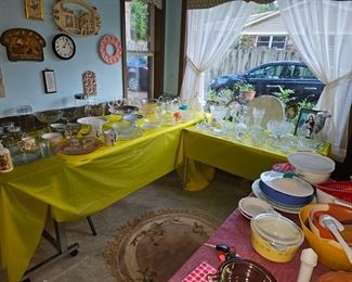 lots of glass, serving platters, pretty dishes  stained glass pictures, cake plates 