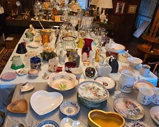 oil lamps, lots of lamps, candle holders, pictures, shuffleboard table, cds