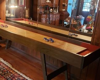 9 ft long shuffleboard table,  30 in tall and 24 in wide