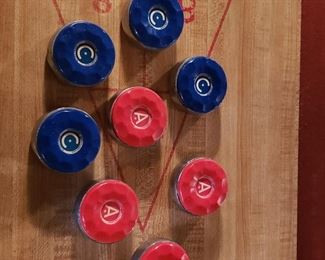shuffleboard pucks