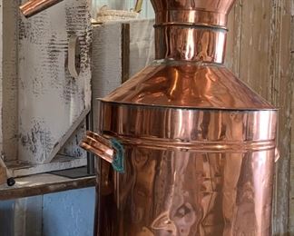 Old Copper Moonshine Stills, one polished 