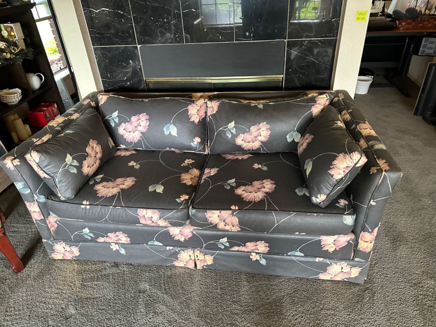Floral print loveseat.  Great heavy construction.  2 available. $100 each