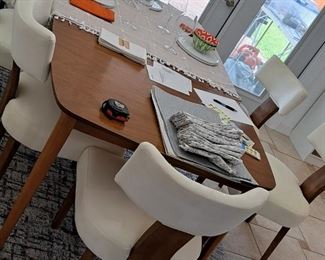 I took the table cover off half of dining table to show off the  slight damage at middle 