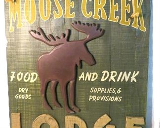 Huge Moose Creek Lodge wall sign