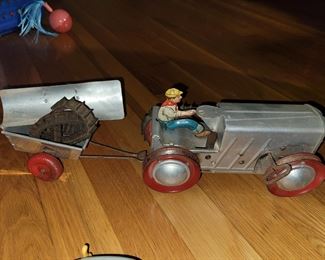 Marx tin wind-up tractor with trailer and plow