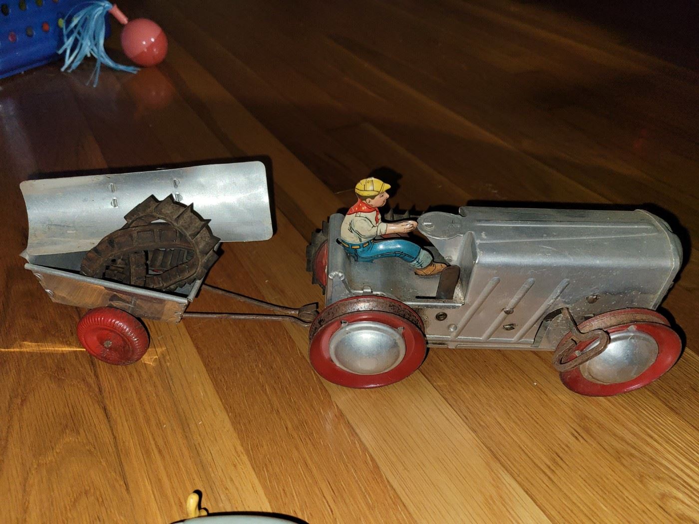 Marx tin wind-up tractor with trailer and plow