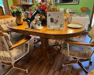table w/claw feet & 6 chairs on rollers