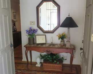 Lots of beautiful vintage area rugs and decor in this lovely home