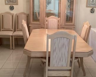 Excellent Condition! Dining table (66” x 42” x 30”) with 1 leaf (24”), two arm chairs, and four armless chairs. Absolutely no stains, spots, or tears on the chair fabric. Set $450