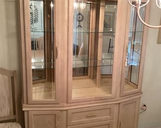 Lighted china cabinet, 59” x 12” x 88”, $300. 