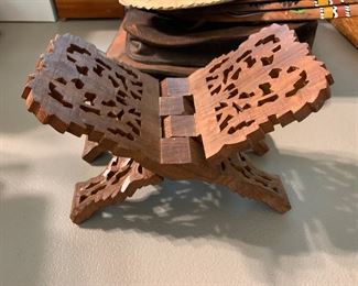 Quran holder, carved from a single slab of wood and folds flat.