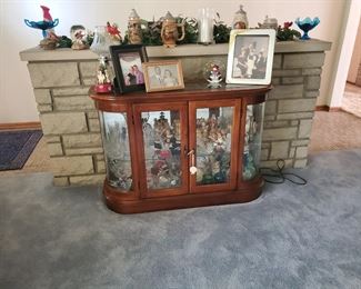 Lighted waist high curio cabinet