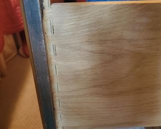 With dovetailed drawers