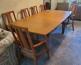 There are (2) captain & (4) dining chairs