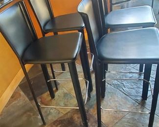 4 Frag leather bar stools 950.00
