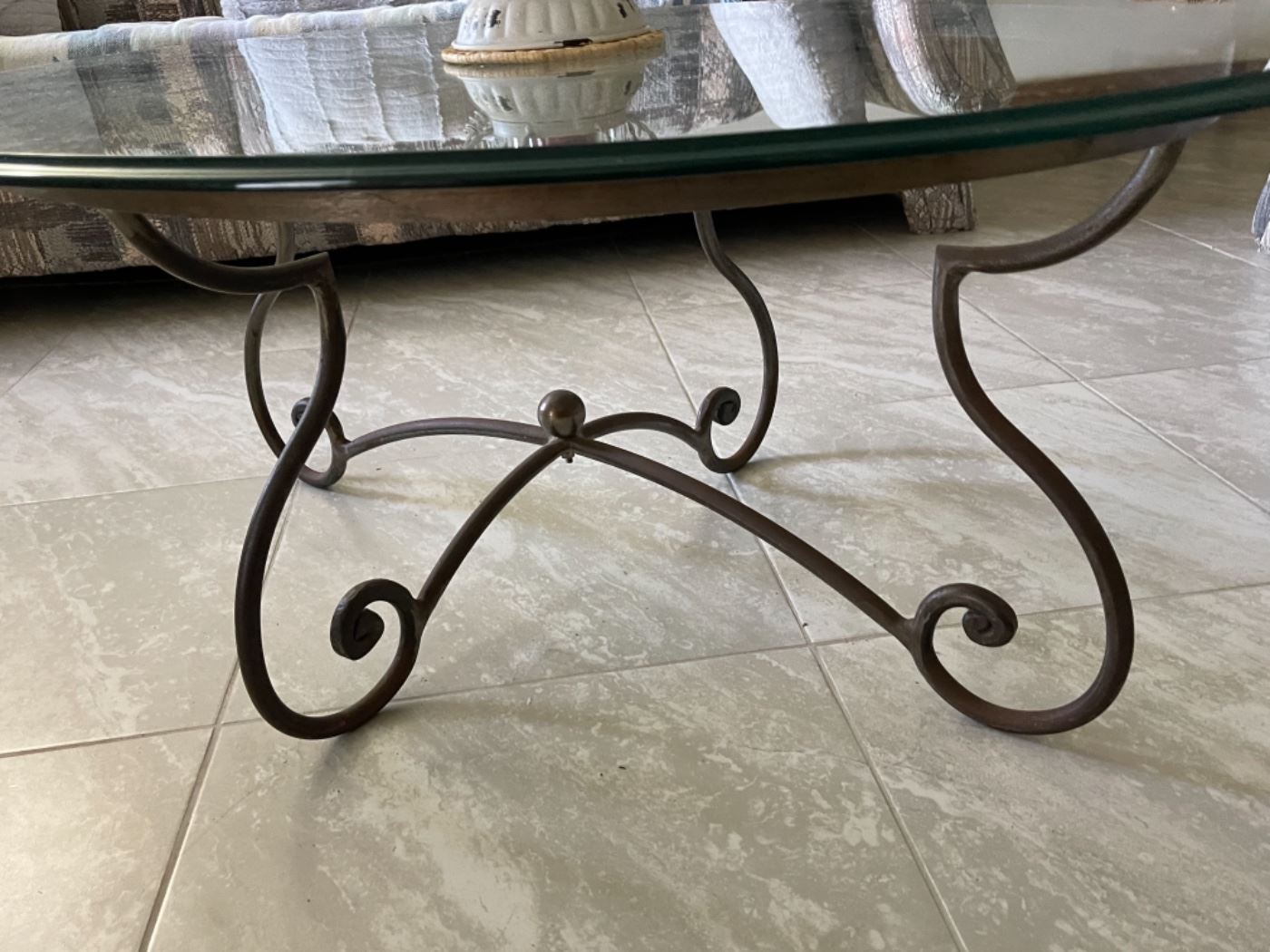 Decorative metal and glass top coffee table. 