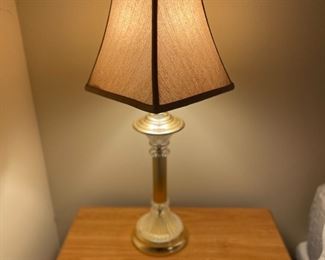 Table lamp with light on.