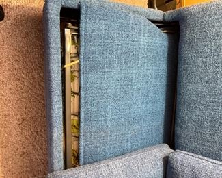 Picture of the mattress part of sofa that is protected with matching cover.