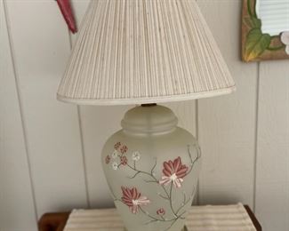 Appears to be hand painted lamp, bottom is like a night light.