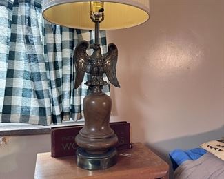 Eagle lamp with wooden bell body, shade is worn 35"H