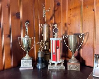 Group of antique and vintage metal and brass trophies, largest is 1936 W. VA High School track meet and is 32"H