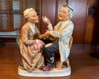 Norleans porcelain doctor visit figurine 8"H