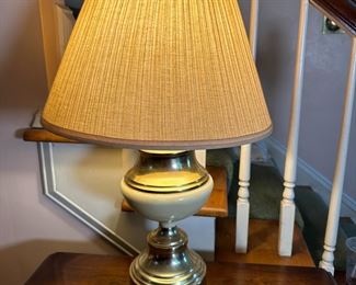 Table lamp with cream body and brass finish, shade needs replaced, 25"H