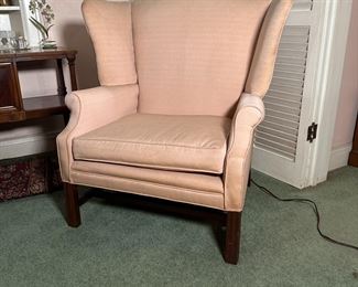 Vintage wing back chair with mahogany legs, ready for reupholstery