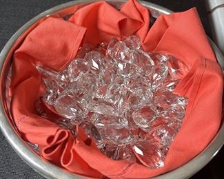 Bowl of approximately 25-30 chandelier prisms